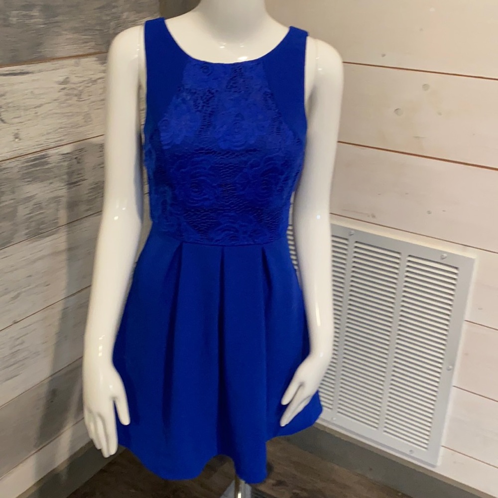 Beautiful Royal blue dress with detailing on top and light pleating at waist.